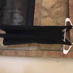 Black formal dress with straps and bow on the back